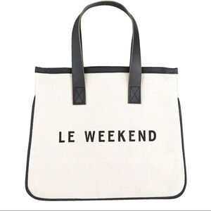New with tags. Mini tote. Canvas with genuine leather handles. Le Weekend